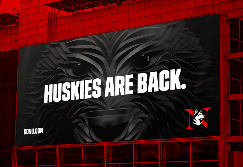 Billboard reading Huskies Are Back